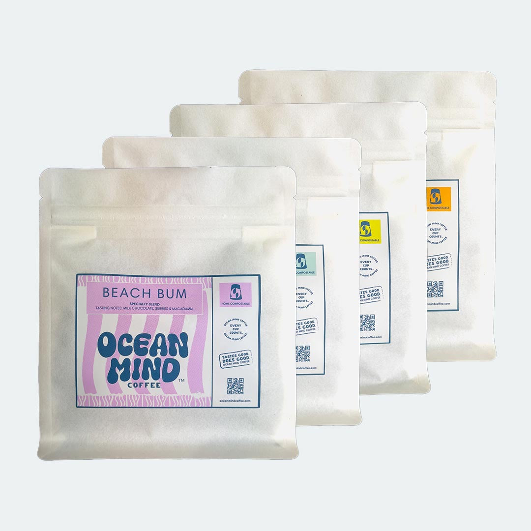 Beach Bum coffee beans with 'Ocean Mind Coffee' branding on a sea mist background
