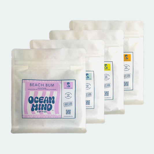 Beach Bum coffee beans with 'Ocean Mind Coffee' branding on a sea mist background
