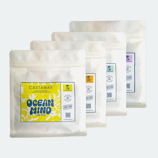 Castaway coffee beans with 'Ocean Mind Coffee' branding on a sea mist background